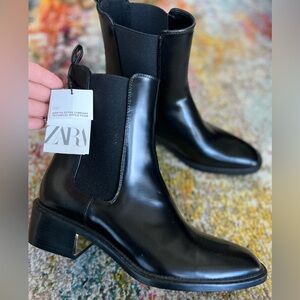 Unworn Zara boots with gold incased heel.